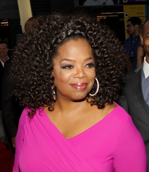 LOS ANGELES, CA - AUGUST 12:  Oprah Winfrey attends LEE DANIELS' THE BUTLER Los Angeles premiere, hosted by TWC, Budweiser and FIJI Water, Purity Vodka and Stack Wines, held at Regal Cinemas L.A. Live on August 12, 2013 in Los Angeles, California.  (Photo by Mike Windle/Getty Images for TWC)